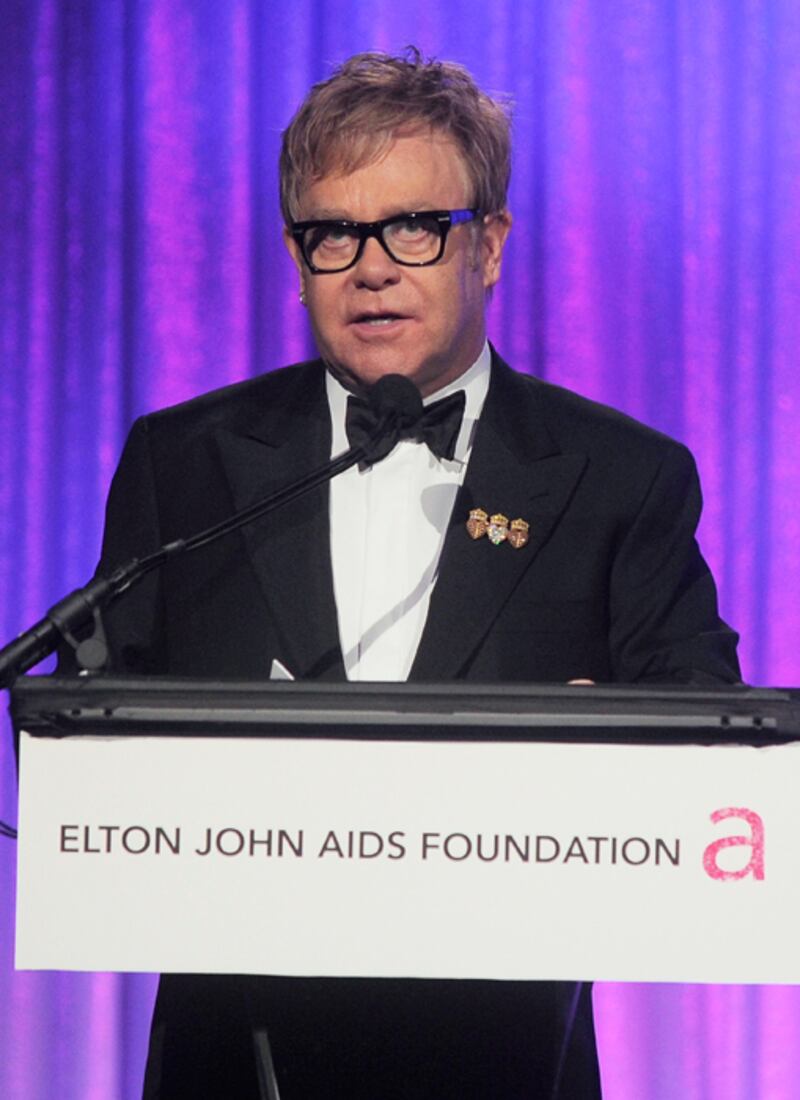 galleries/2010/11/30/stars-who-fight-aids/aids-celeelton-john_jy62gs