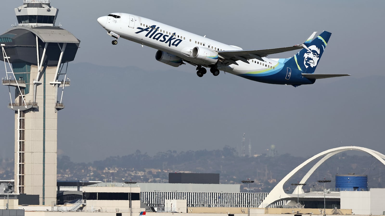 LOS ANGELES, CALIFORNIA - DECEMBER 02: An Alaska Airlines plane takes off at Los Angeles International Airport (LAX) following the Thanksgiving holiday on December 2, 2024 in Los Angeles, California. According to the Transportation Security Administration (TSA), Thanksgiving Sunday was the busiest day for commercial airline travel ever, with preliminary numbers indicating more than 3 million travelers were screened in U.S. airports yesterday with many people still making their way home today. (Photo by Mario Tama/Getty Images)