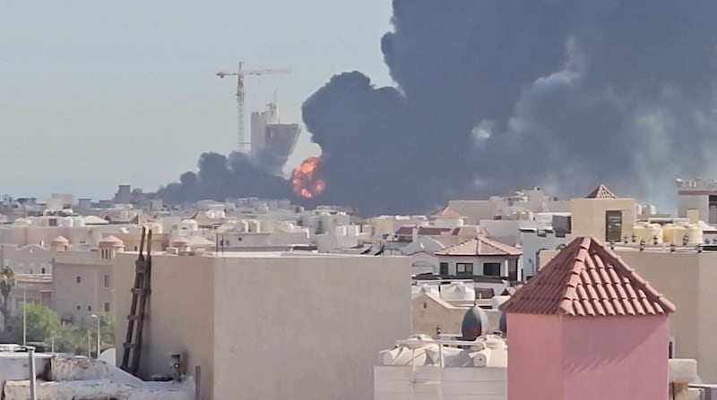 Smoke billows near the oil facility in Mangaf, Kuwait, July 18, 2026, in this screen grab obtained from a social media video. Social Media/via REUTERS  THIS IMAGE HAS BEEN SUPPLIED BY A THIRD PARTY. MANDATORY CREDIT. NO RESALES. NO ARCHIVES. NEWS USE ONLY.  Verification lines: - Tower, mosque, and buildings matched satellite and archive imagery. - Date verified by statement from Kuwait Petroleum Corporation that one of its oil facilities had been hit in "repeated Iranian attacks," causing significant damage and some injuries, according to the state news agency. - The area where the smoke is shown in the video is marked as a Kuwait Petroleum Company facility on Google maps.