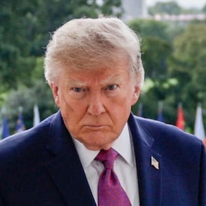 President Donald Trump, first lady Melania Trump and Chinese President Xi Jinping after watching a military demonstration from a balcony of the White House in Washington, D.C., US, September 24, 2026.