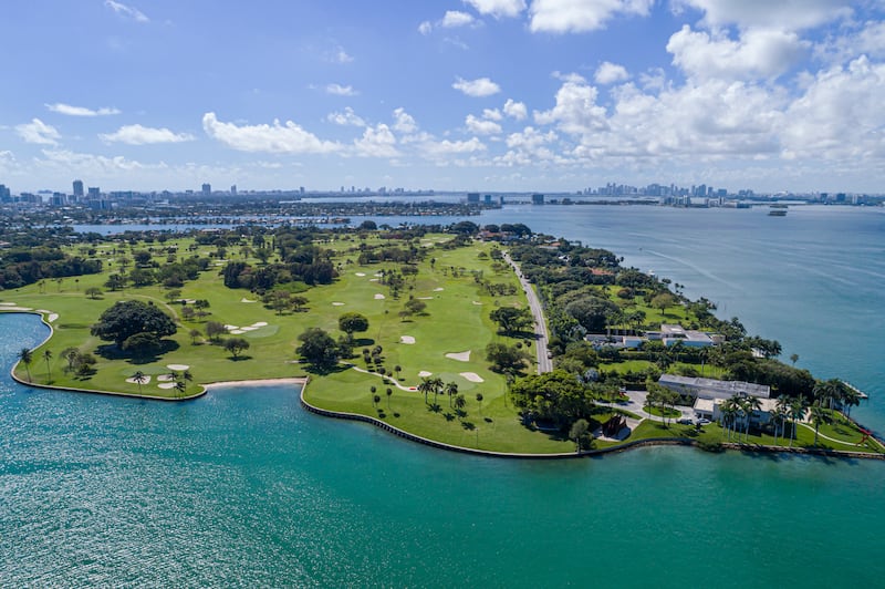 Florida, Miami, Indian Creek Island, country club, golf course on Billionaire Bunker, aerial view.