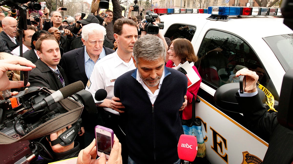 cheats/2012/03/16/george-clooney-arrested-at-embassy/clooney-arrested-cheat_ioiqyn