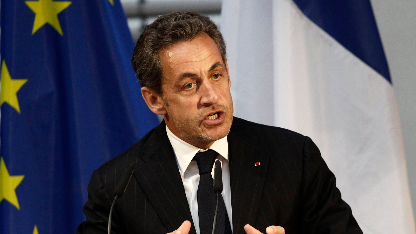 articles/2014/03/22/sarkozy-s-surveillance-scandal/140321-sarkozy-mcnicoll-tease_lqigya