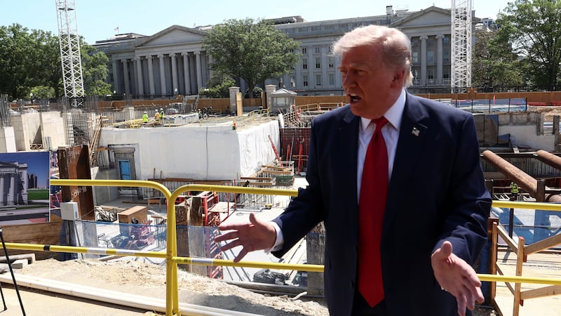 U..S. President Donald Trump speaks at the site of ongoing construction of the planned White House ballroom in Washington, D.C., U.S., May 19, 2026. REUTERS/Kevin Lamarque