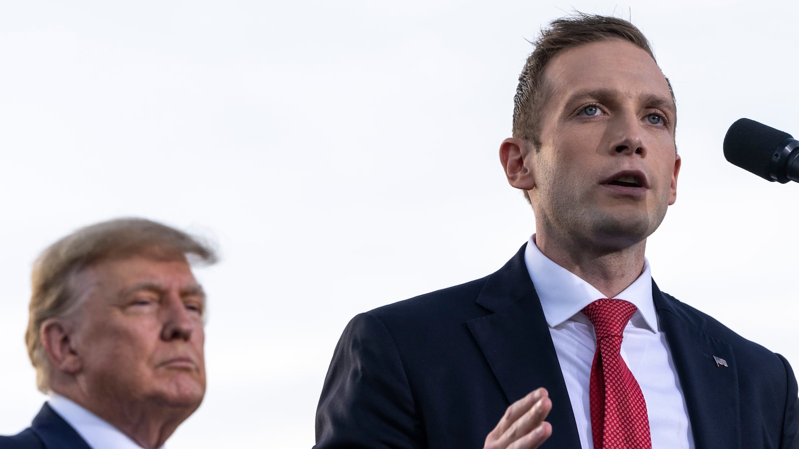 DELAWARE, OH - APRIL 23: (L-R) Former U.S. President Donald Trump listens as Max Miller, Republican candidate for Ohio's 7th congressional district, speaks during a rally hosted by the former president at the Delaware County Fairgrounds on April 23, 2022 in Delaware, Ohio. Last week, Trump announced his endorsement of J.D. Vance in the Ohio Republican Senate primary. (Photo by Drew Angerer/Getty Images)