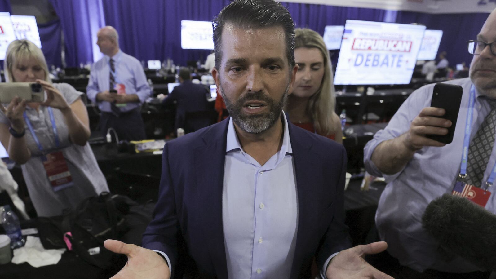 Donald Trump Jr. speaks to the media.