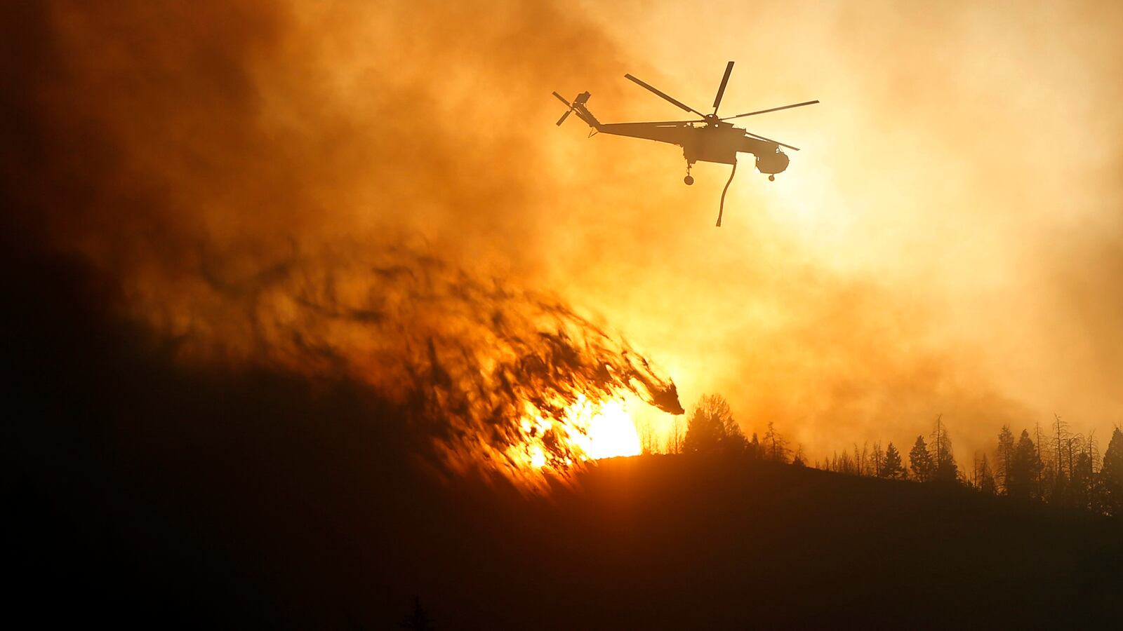 galleries/2013/08/18/wildfires-rage-in-idaho-photos/130818-idaho-fire-tease_d9qk9d