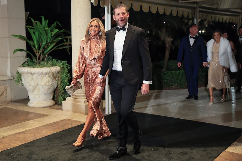 Eric Trump, son of U.S. President Donald Trump, arrives with his wife Lara Trump