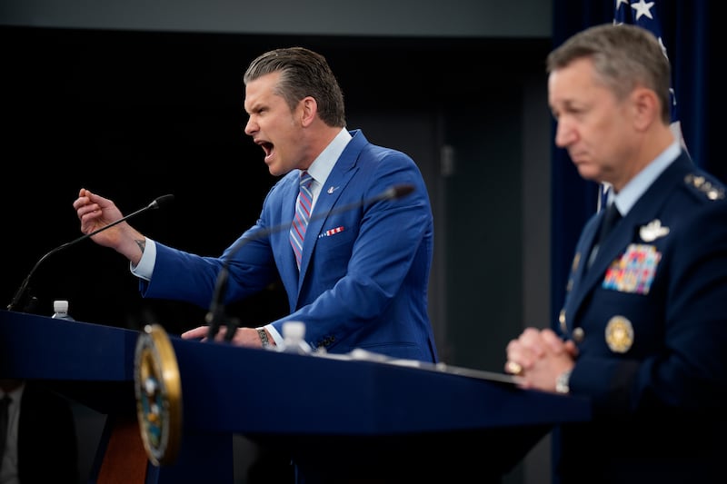 Defense Secretary Pete Hegseth (L), accompanied by Chairman of the Joint Chiefs of Staff Air Force Gen. Dan Caine (R), speaks during a news conference at the Pentagon on June 26, 2025 in Arlington, Virginia.