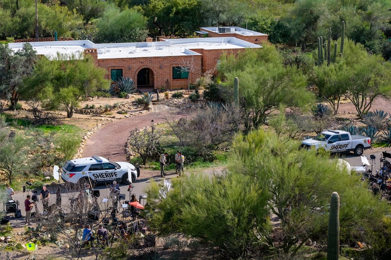 TUCSON, ARIZONA - FEBRUARY 10: In an aerial view, law enforcement and news broadcasters are stationed outside of Nancy Guthrie's residence on February 10, 2026 in Tucson, Arizona. Searches continues for Nancy Guthrie, the 84-year-old mother of U.S. journalist and television host Savannah Guthrie, after she went missing from her home on the morning of February 1st. Guthrie's possible abductors had set a deadline of 5pm on February 9 for a $6 million payment. (Photo by Brandon Bell/Getty Images)