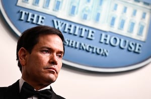 US Secretary of State Marco Rubio listens to US President Donald Trump speak during a press briefing in the Brady Briefing Room at the White House in Washington, DC, shortly after a shooting incident at the White House Correspondents' Dinner on April 25, 2026.