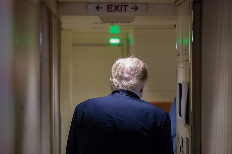 U.S. President Donald Trump speaks to members of the media aboard Air Force One, en route to Joint Base Andrews, Maryland, U.S., following a two-day visit to Ireland, September 13, 2026. REUTERS/Kylie Cooper