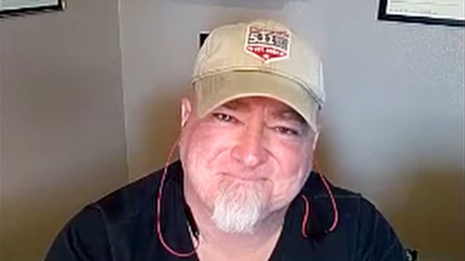 Luis Elizondo in a baseball cap