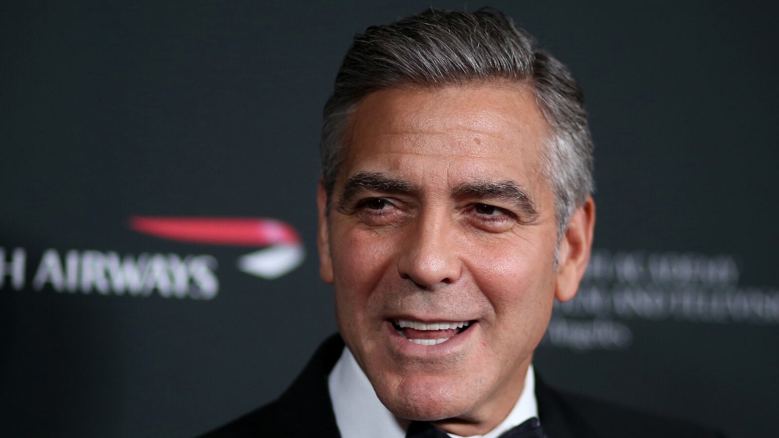 cheats/2013/12/09/clooney-backs-ukraine-protests/131209-clooney-ukraine-cheat_yvjvde