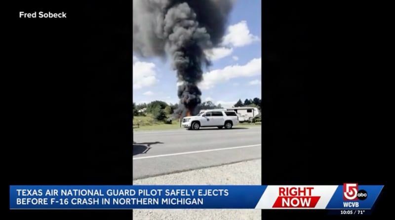 Footage of an F-16 crashing in Michigan and going up in flames.