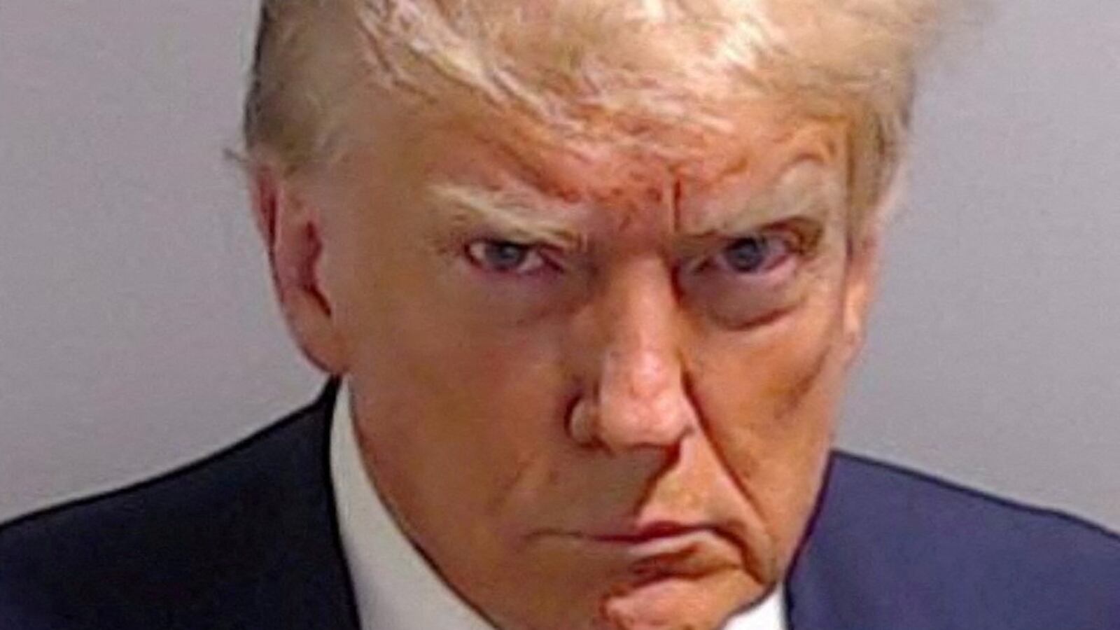 Former U.S. President Donald Trump is shown in a police booking mugshot released by the Fulton County Sheriff's Office.