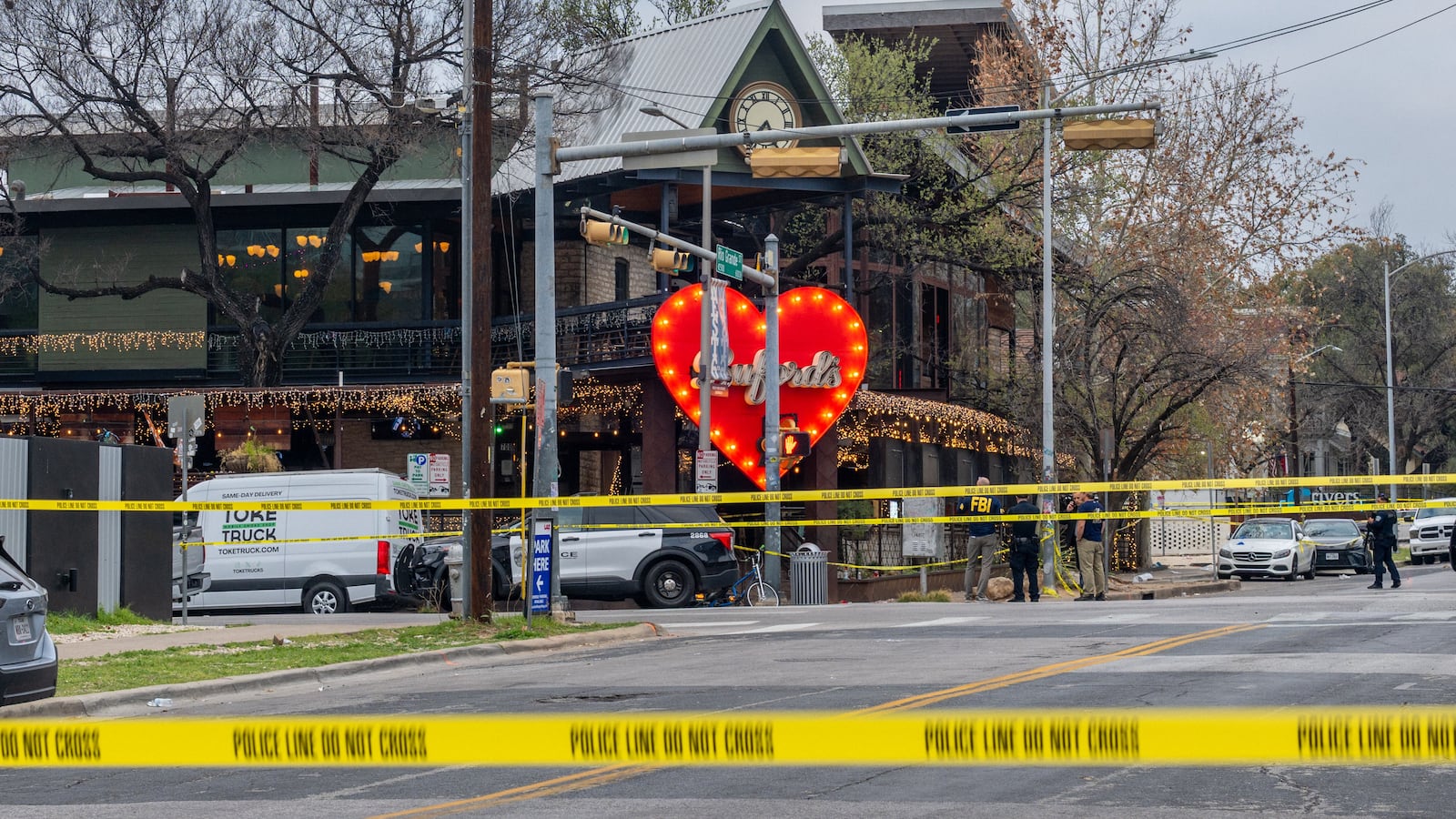 Members of the FBI and local law enforcement investigate after a mass shooting outside of Buford's bar in downtown on March 01, 2026 in Austin, Texas