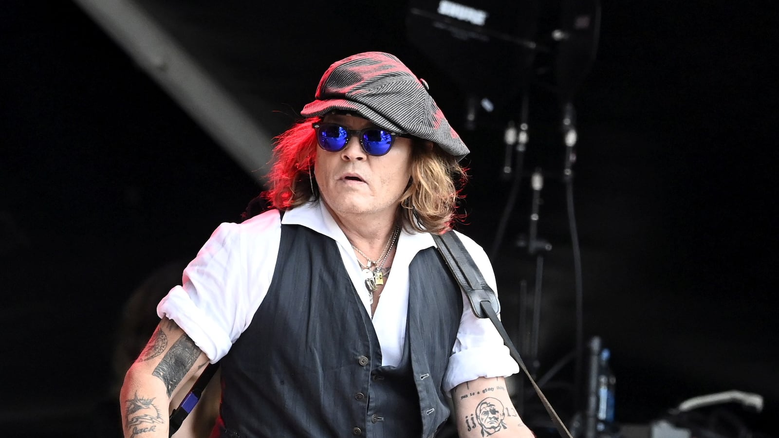 Actor Johnny Depp performs with musician Jeff Beck (not pictured) during the Helsinki Blues Festival in Helsinki, Finland, June, 19, 2022.