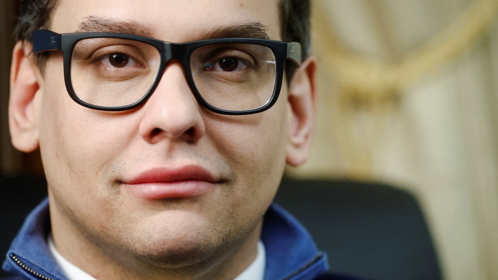 Rep. George Santos (R-NY) poses for a portrait at his desk in the Longworth House Office Building on Capitol Hill in Washington, D.C., Feb. 28, 2023.