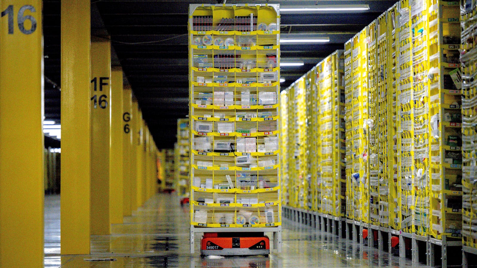 A photo of robots transporting goods at an Amazon warehouse