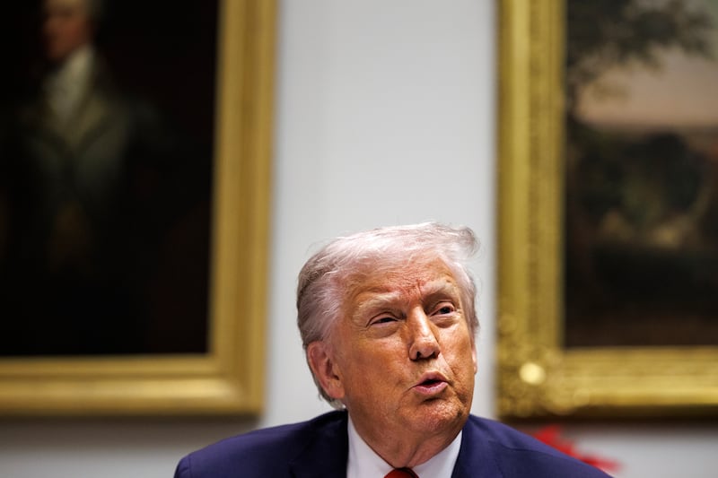 President Donald Trump hosts a roundtable event with business leaders inside the Roosevelt Room at the White House in Washington, on December 10, 2025.