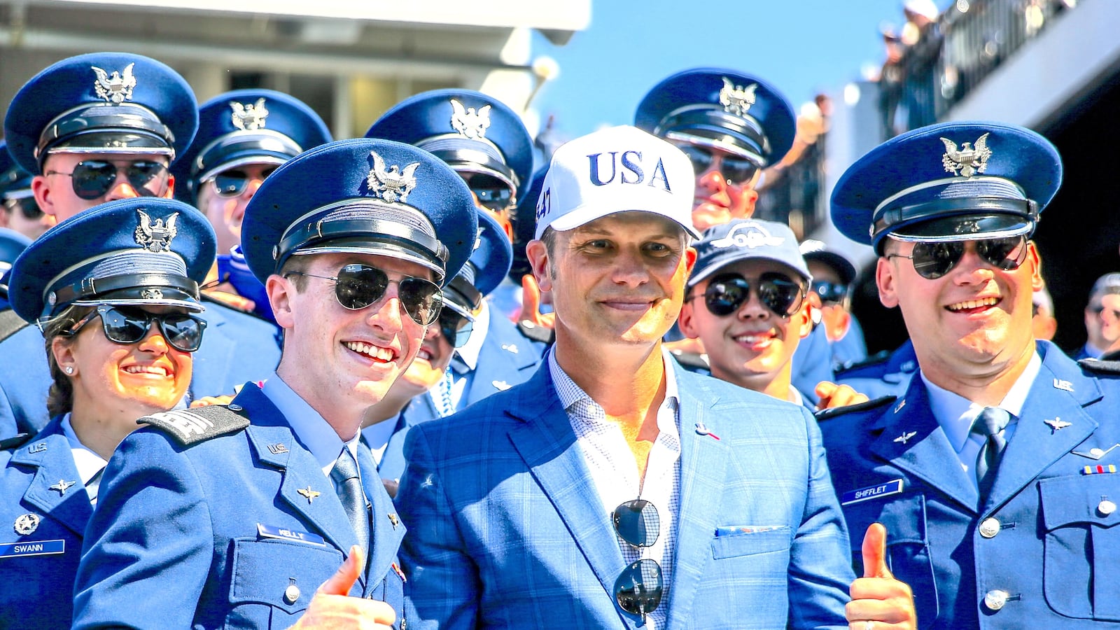 Secretary of War Pete Hegseth poses for a photo with cadets