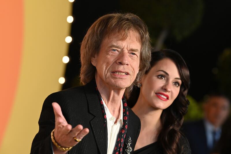 BEVERLY HILLS, CALIFORNIA - MARCH 02: Mick Jagger and Melanie Hamrick attend the 2025 Vanity Fair Oscar Party Hosted By Radhika Jones at Wallis Annenberg Center for the Performing Arts on March 02, 2025 in Beverly Hills, California. (Photo by Axelle/Bauer-Griffin/FilmMagic)