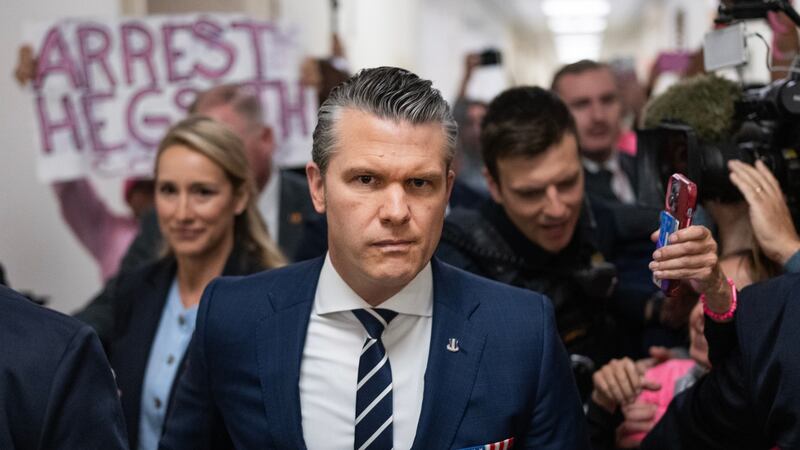 Defense Secretary Pete Hegseth and his wife, Jennifer, arrive on Capitol Hill to testify before the House Armed Services Committee on Wednesday, April 29, 2026.