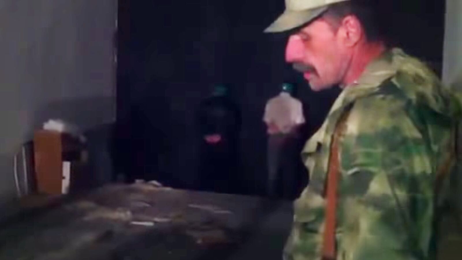 articles/2014/09/10/a-torture-survivor-on-ukraine-s-tortured-ceasefire/140910-nemtsova-shooting-teease_rr2yaw