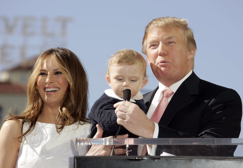 Donald and Melania Trump with baby Barron in 2007. The future president said in December of that year that he feared babies receiving too many vaccines at once and that it was leading to autism.