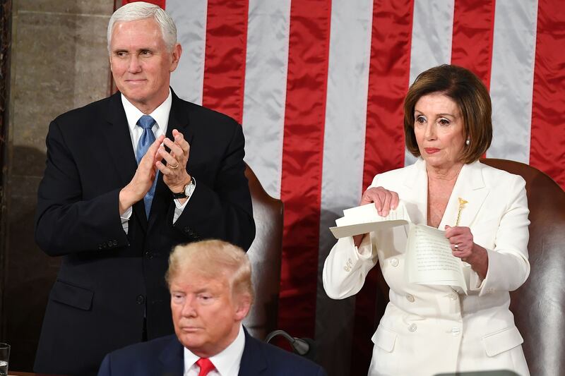 Speaker Nancy Pelosi rips a copy of US President Donald Trumps speech after he delivered the State of the Union address at the US Capitol in Washington, DC, on February 4, 2020.
