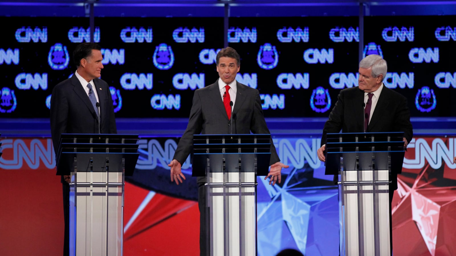 articles/2011/10/24/mitt-romney-rick-perry-herman-cain-why-the-gop-demonizes-illegals/gop-debate-illegals-beinart_kyzhmb