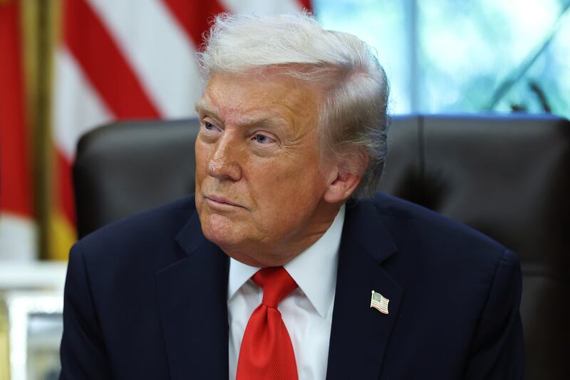 WASHINGTON, DC - OCTOBER 21: U.S. President Donald Trump looks on during an event celebrating Diwali in the Oval Office of the White House on October 21, 2025 in Washington, DC. Trump held the event to honor the Hindu festival that symbolizes the victory of light over darkness. (Photo by Anna Moneymaker/Getty Images)