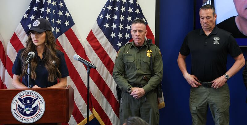 US Department of Homeland Security Secretary Kristi Noem (L) speaks during a news conference alongside (L/R) Gregory Bovino, Chief Patrol Agent at the El Centro Sector of US Customs and Border Patrol, Acting ICE Director Todd Lyons, and US Attorney for the Central District of California Bilal Essayli