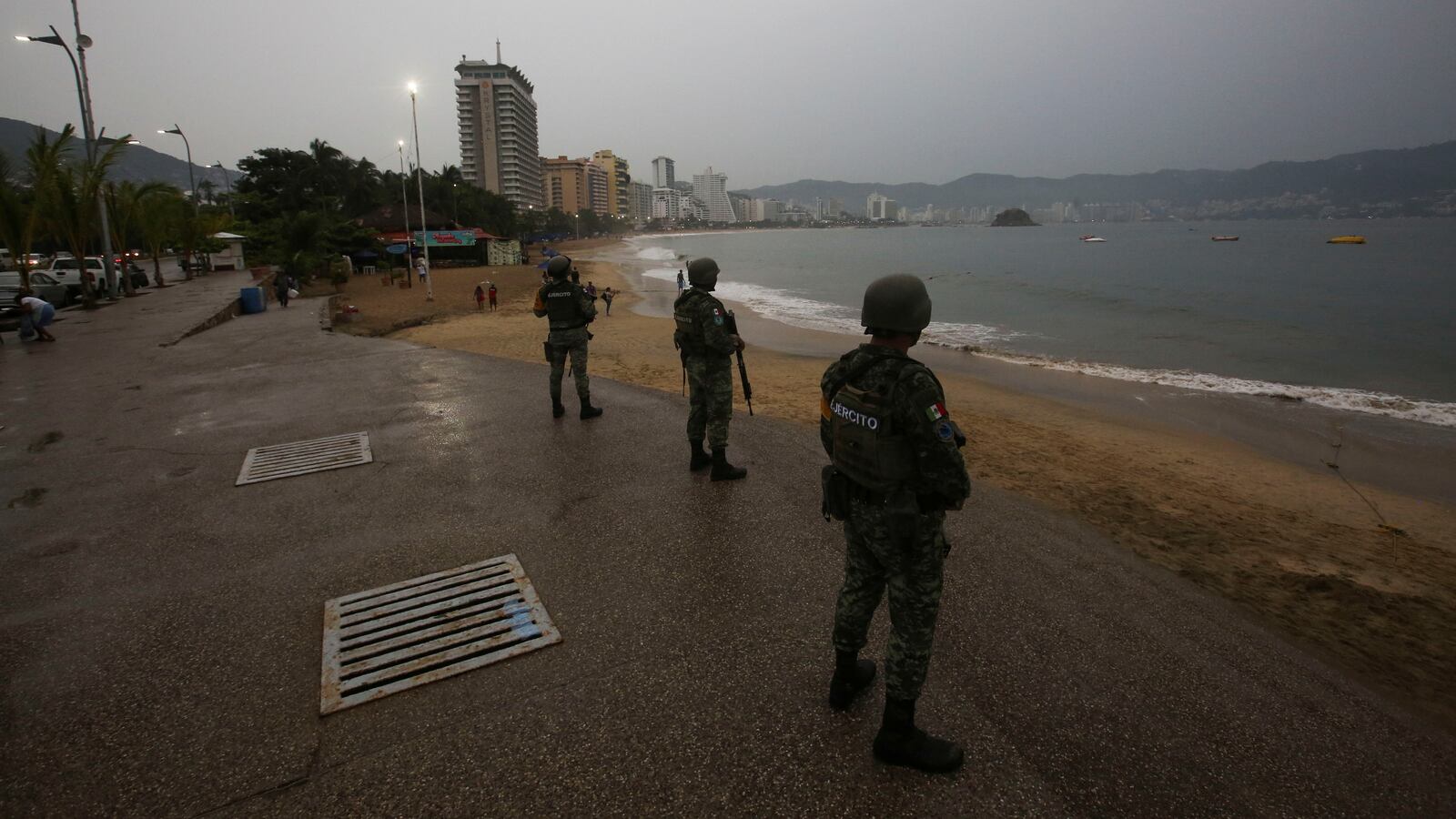 Soldiers keep watch at a beach as Hurricane Otis barrels towards Acapulco, Mexico, October 24, 2023.