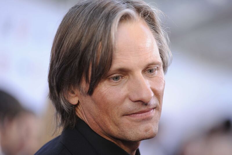 articles/2011/10/15/horoscopes-october-16-22-2011/viggo-mortensen-horoscopes-starsky-cox_oxsdln