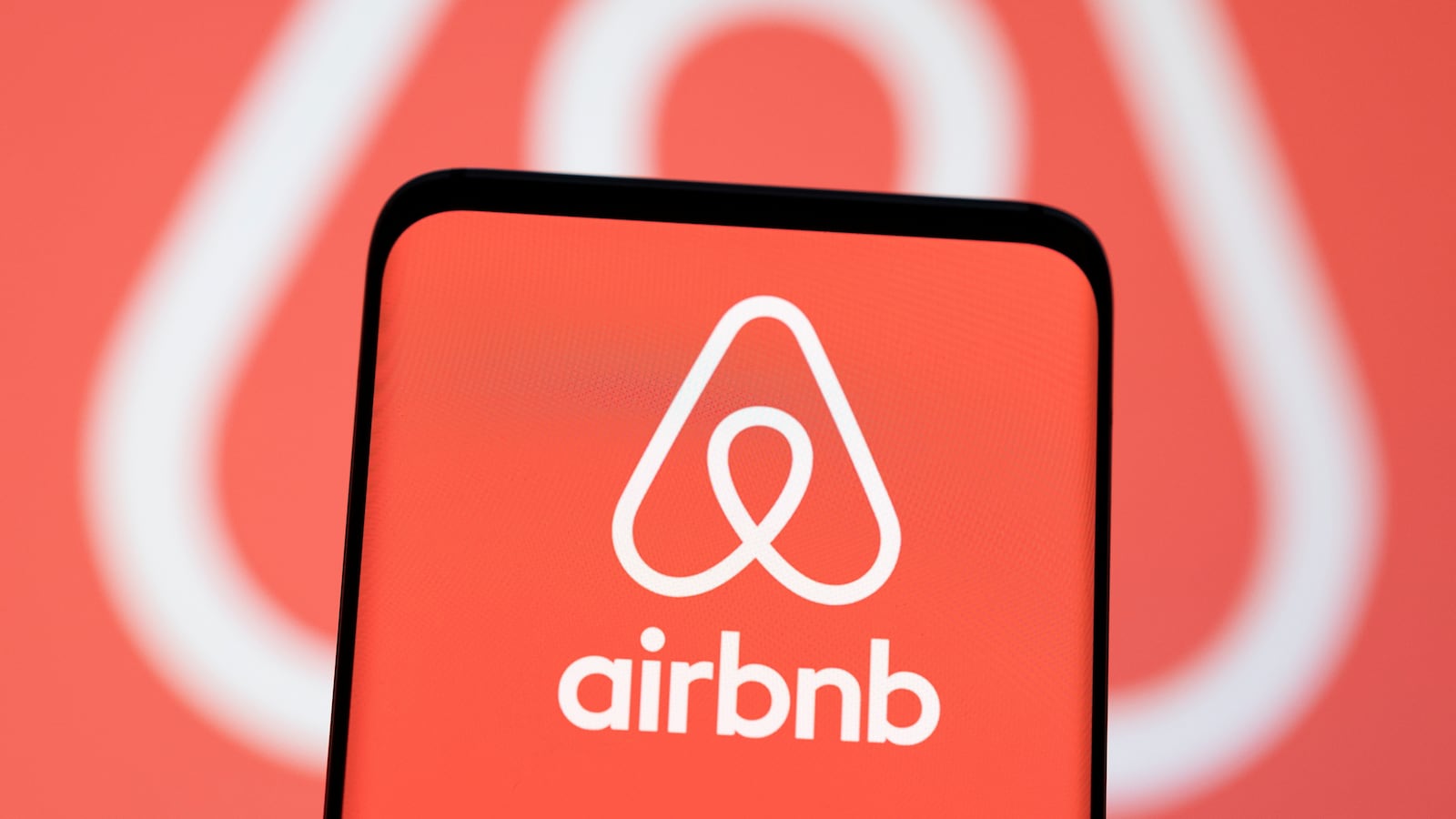 Airbnb logo is seen displayed in this illustration taken, May 3, 2022.