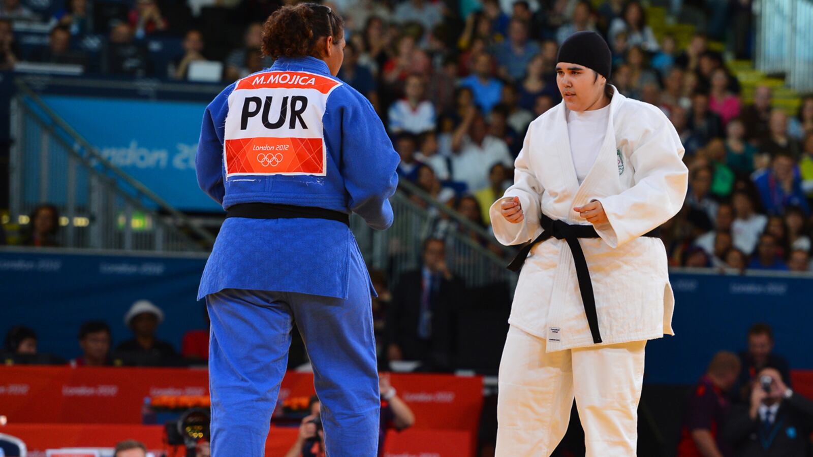 articles/2012/08/06/saudi-olympic-athletes-test-states-dedication-to-gender-apartheid/saudi-arabia-gender-apartheid-olympics-ahmed-tease_fia6tc