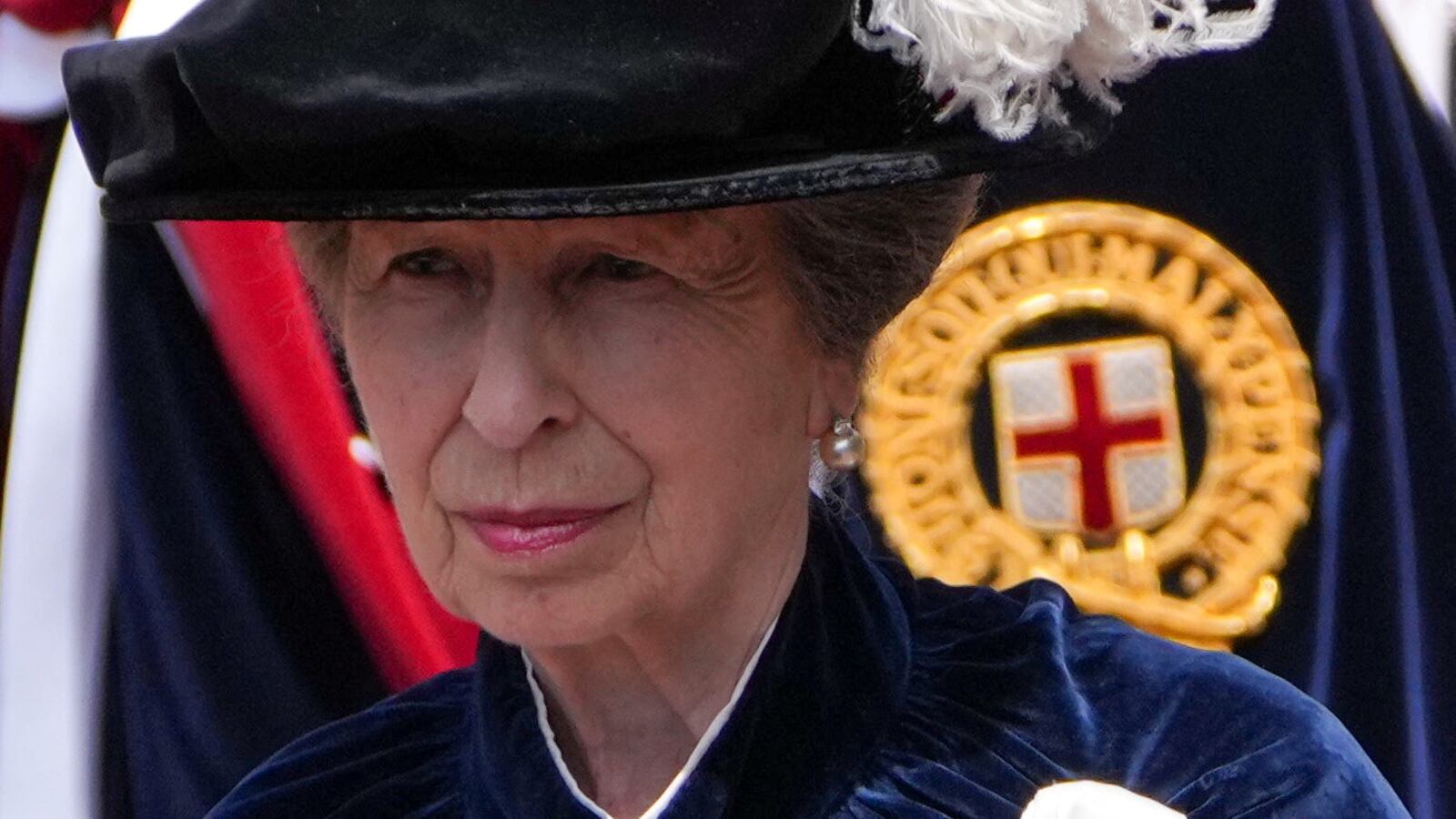 Princess Anne, arrives for the Order of the Garter service at St George's Chapel sporting a chic metallic lip.