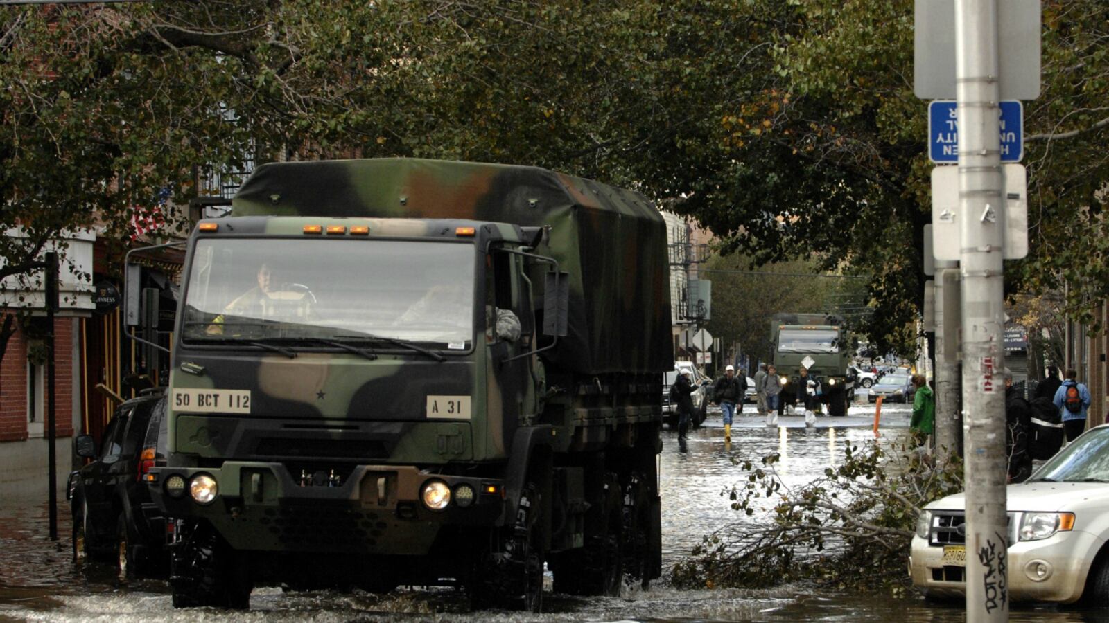 cheats/2012/11/01/nj-to-use-military-trucks-as-polls/new-jersey-truck-polling-station-cheat_m2bp2o