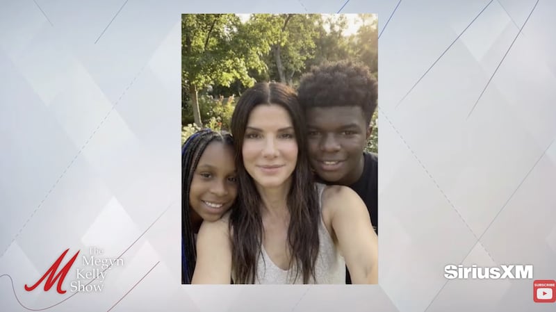 Kelly included several photos of Bullock and her children in the podcast video; some appear to come from sources unaffiliated with Bullock, prompting users to speculate whether they’re AI-generated.