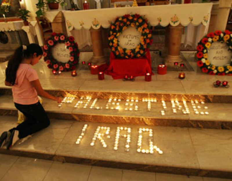 articles/2010/11/06/christians-iraqs-canaries-in-the-coal-mine/griswold-church-attacks_139118_ksyh9b