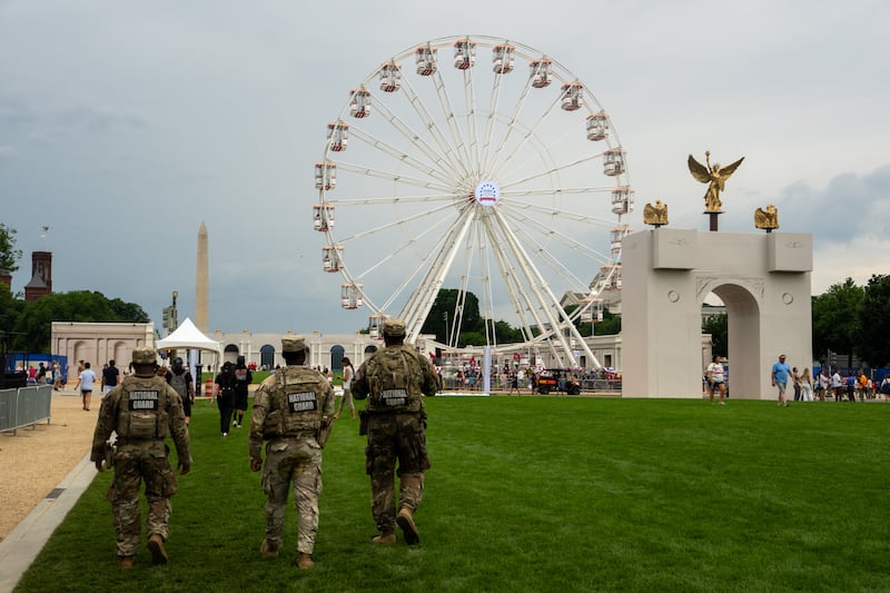 National Guard soldiers inspect the exhibitions at the Great American State Fair on June 26, 2026