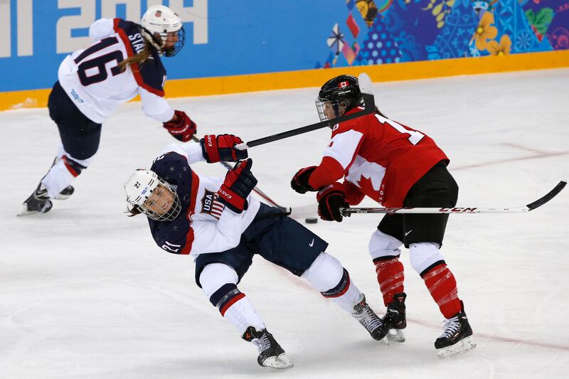galleries/2014/02/13/gloves-come-off-and-women-s-hockey-gets-dirty-in-sochi-photos/140212-oly-hockey8_kptwjz