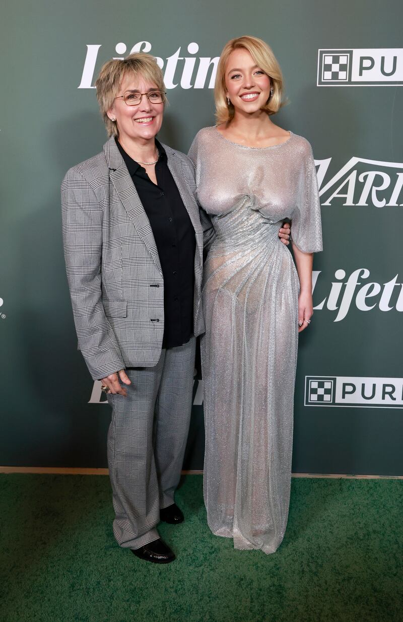 BEVERLY HILLS, CALIFORNIA - OCTOBER 29:  (EDITOR’S NOTE: Image contains partial nudity.) Christy Martin and Sydney Sweeney attend Variety's 2025 Power Of Women at The Beverly Hills Hotel on October 29, 2025 in Beverly Hills, California.