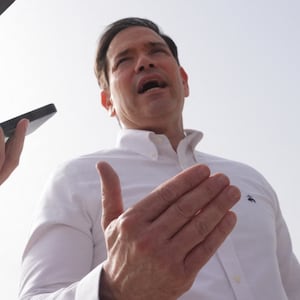 TOPSHOT - US Secretary of State Marco Rubio speaks to journalists before boarding his plane at Indira Gandhi International Airport in New Delhi on May 25, 2026. (Photo by Julia Demaree Nikhinson / POOL / AFP via Getty Images)