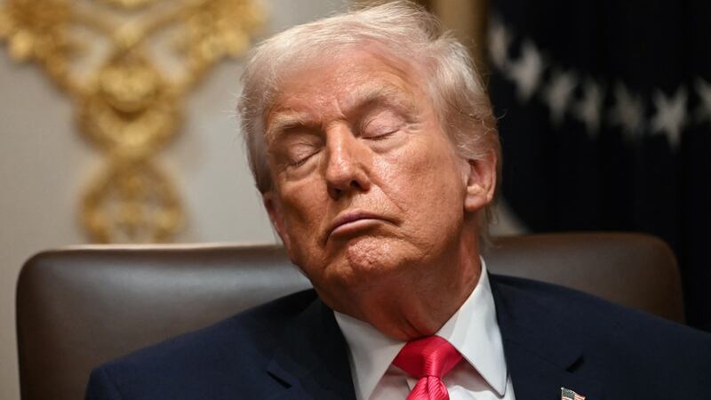 US President Donald Trump attends a Cabinet Meeting in the Cabinet Room of the White House in Washington, DC on December 2, 2025.