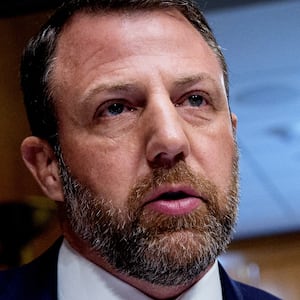 WASHINGTON, DC - FEBRUARY 25: Sen. Markwayne Mullin (R-OK) (L), accompanied by Sen. Roger Marshall (R-KS) (R), speaks during a nomination hearing for Dr. Casey Means, for the medical director in the Regular Corps of the Public Health Service and U.S. surgeon general during a Senate Health, Education, Labor and Pensions Committee hearing on Capitol Hill on February 25, 2026 in Washington, DC. Means, a health influencer, will make her case to be the next surgeon general. (Photo by Andrew Harnik/Getty Images)