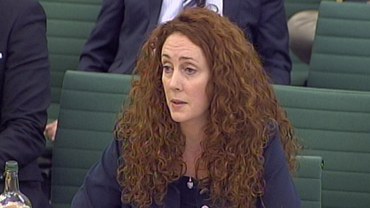 articles/2011/07/20/rebekah-brooks-hair-distracts-at-murdoch-phone-hacking-scandal-hearing/rebekah-brooks-hair-givhan_ktefug