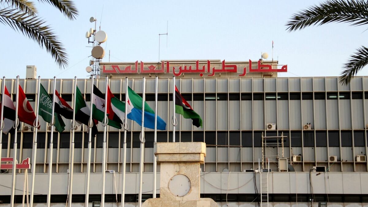 cheats/2012/06/04/libyan-gunmen-take-airport-hostage/cheat-tripoli-airport-standoff_asoe6c